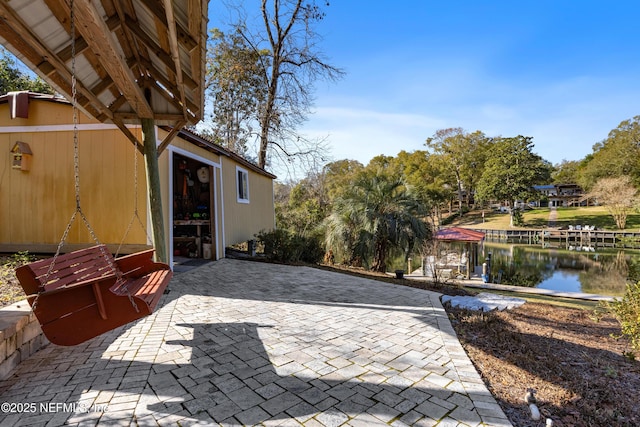 view of patio / terrace with a water view