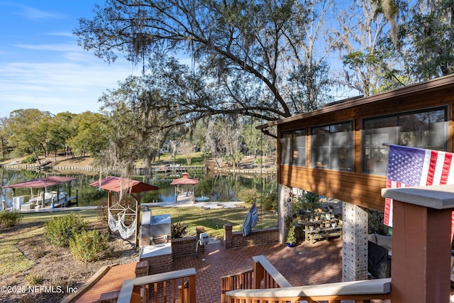 wooden deck with a water view