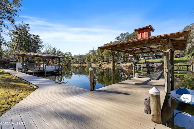 view of dock with a water view