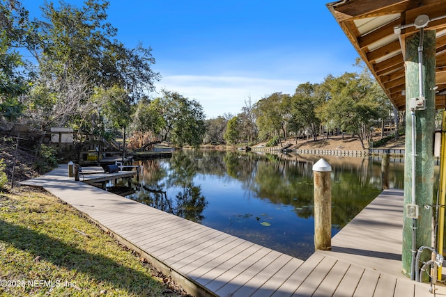 view of dock featuring a water view