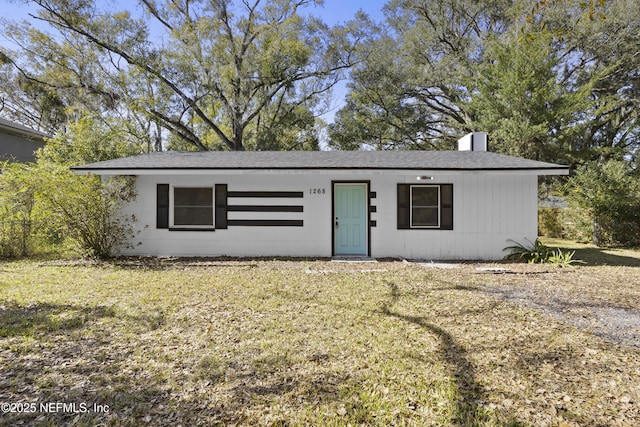 view of front of home with a front yard