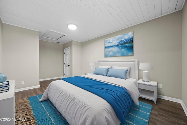 bedroom with dark wood-type flooring