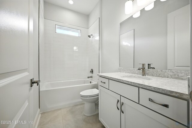 56 Pine Grove Pt, Saint Augustine, FL 32092 - bathroom featuring toilet, tile patterned floors, vanity, and tub / shower combination