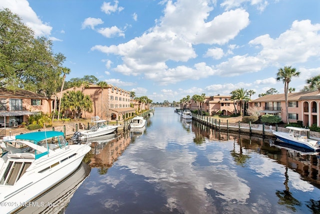 property view of water featuring a dock