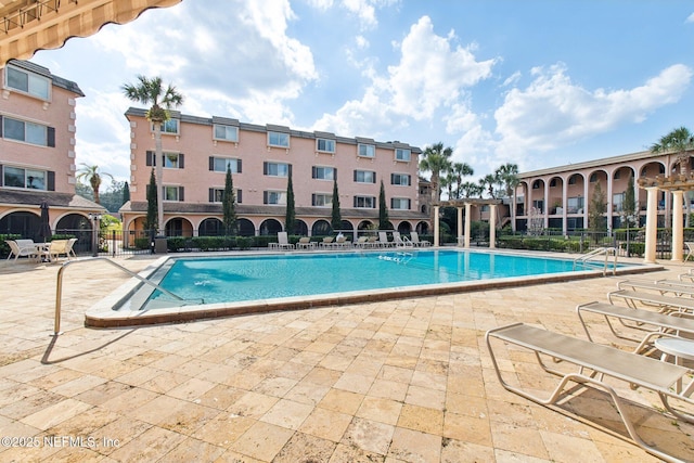 view of pool featuring a patio area