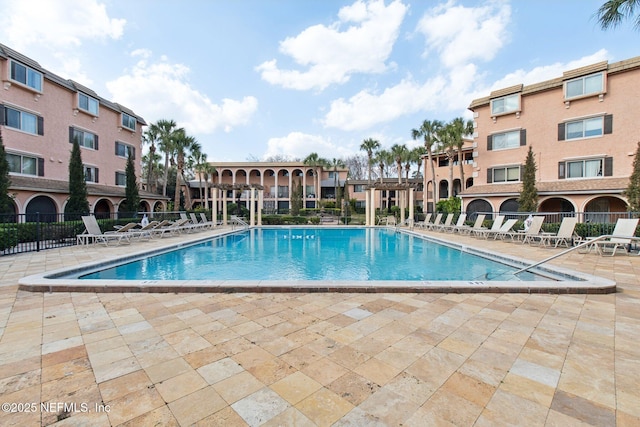 view of pool featuring a patio