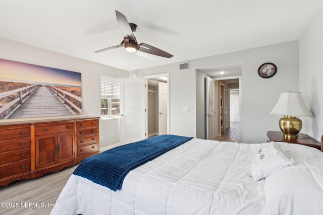 bedroom with a closet and ceiling fan