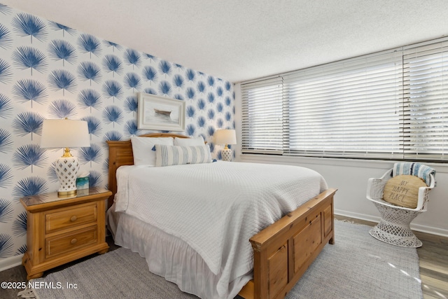 bedroom featuring a textured ceiling