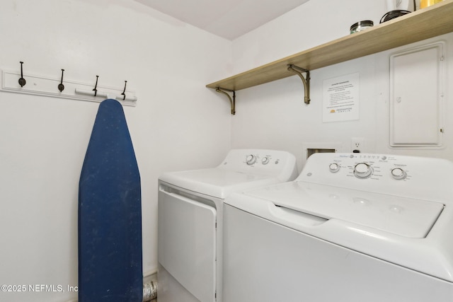 laundry room featuring washing machine and dryer