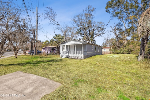 view of yard featuring a porch