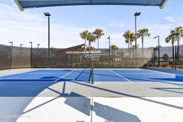 view of sport court with tennis court