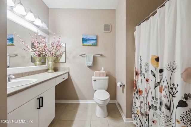 bathroom featuring vanity, curtained shower, tile patterned floors, and toilet