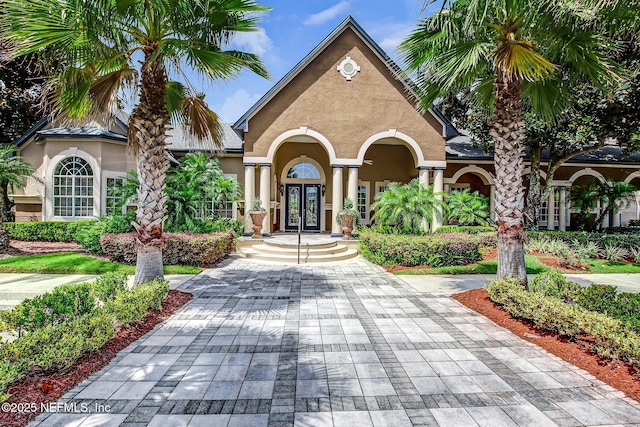 view of front facade featuring french doors