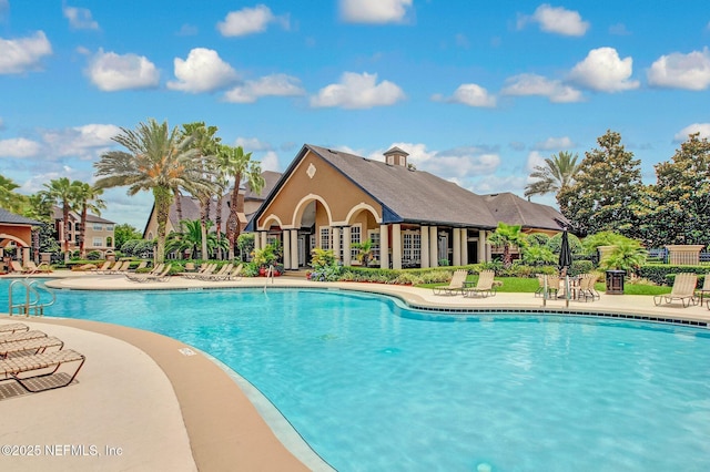 view of pool featuring a patio area