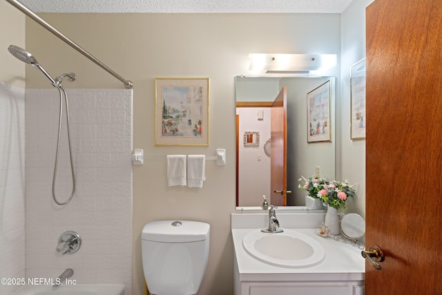 full bathroom featuring vanity, toilet, and shower / tub combination