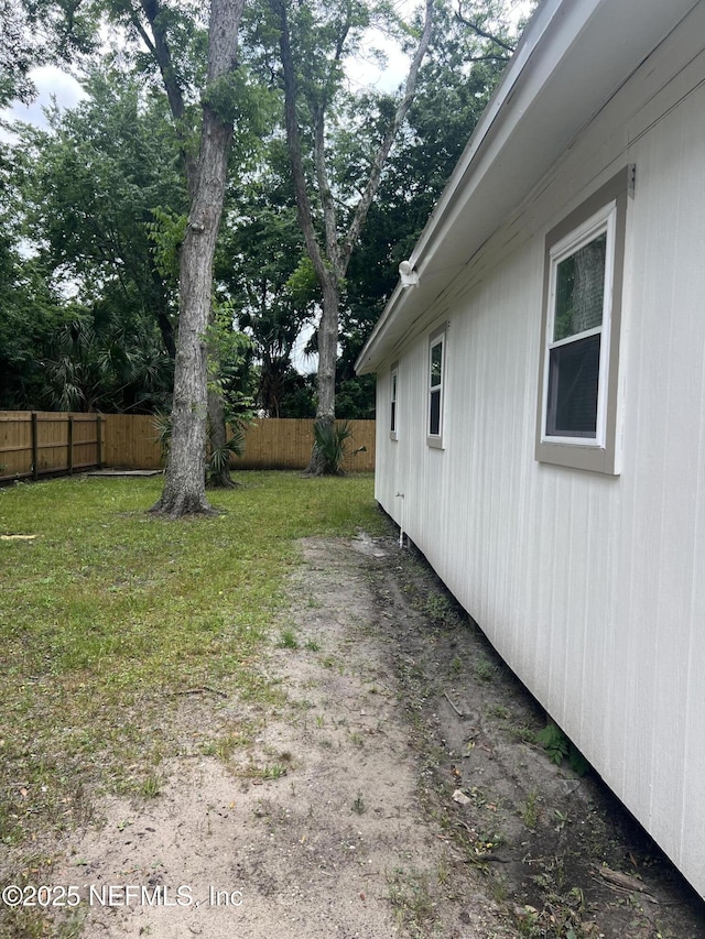 view of yard with fence