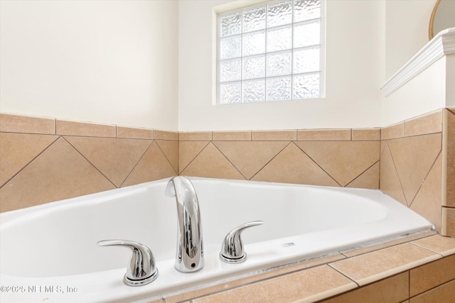 bathroom with a relaxing tiled tub