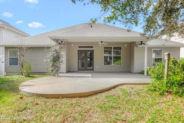 rear view of house featuring french doors, ceiling fan, and a patio area