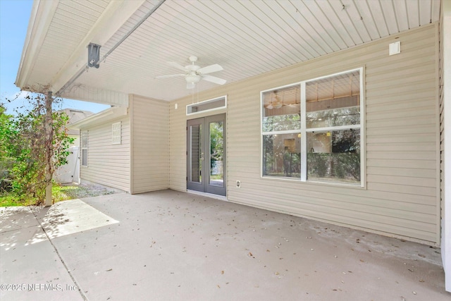 view of patio featuring ceiling fan