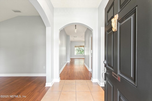 view of tiled foyer entrance