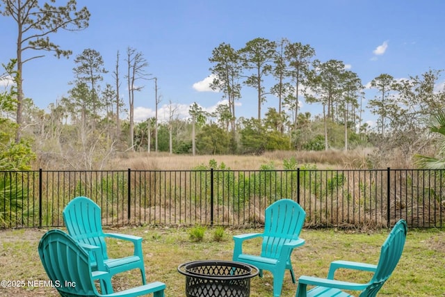 exterior space featuring an outdoor fire pit