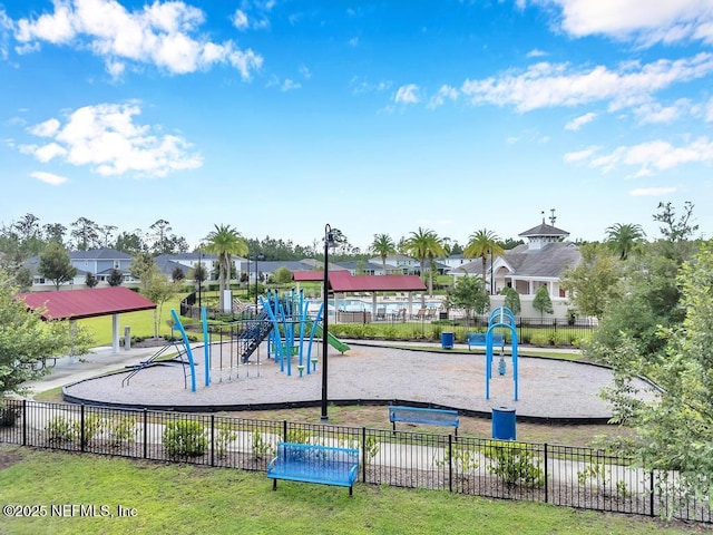 view of play area featuring a lawn