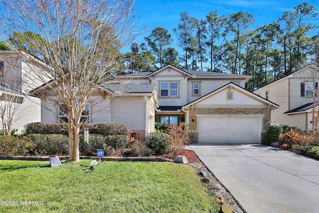 view of front facade featuring a garage and a front yard