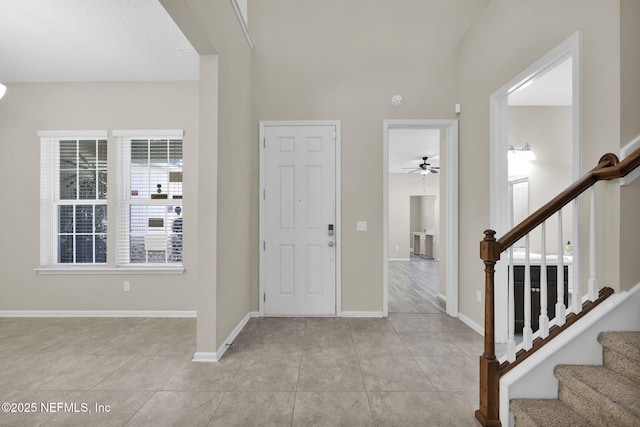 entryway featuring light tile patterned flooring