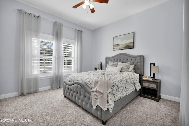 bedroom with ceiling fan and carpet