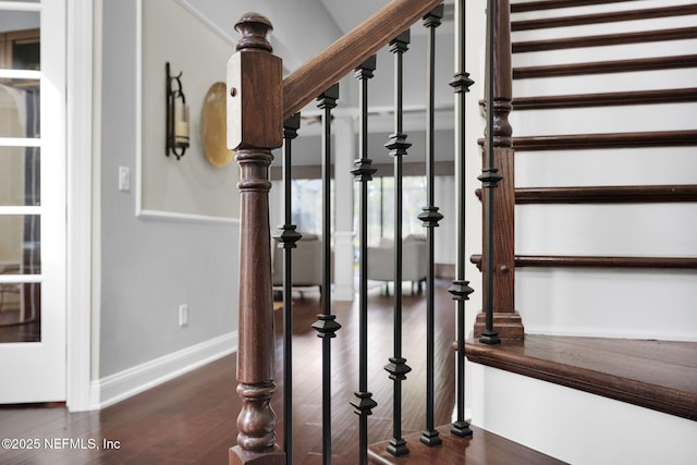 stairway with wood-type flooring