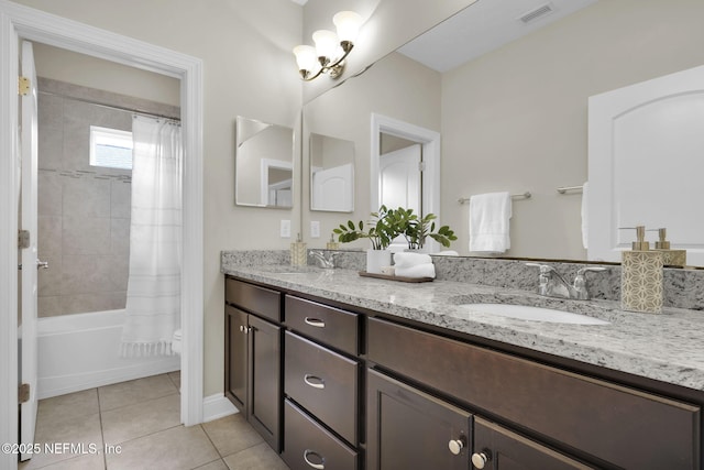 full bathroom featuring tile patterned floors, toilet, vanity, and shower / bath combo