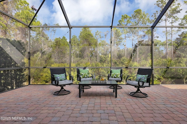 view of patio / terrace with glass enclosure