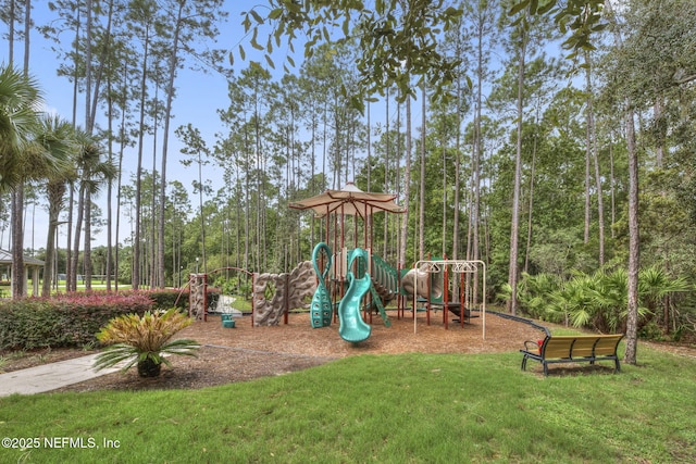 view of jungle gym featuring a lawn