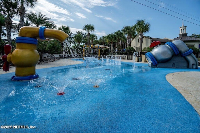 view of pool featuring a patio and pool water feature