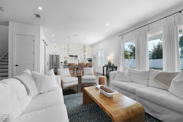 living room with a barn door