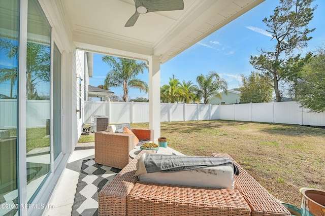 exterior space featuring cooling unit and ceiling fan