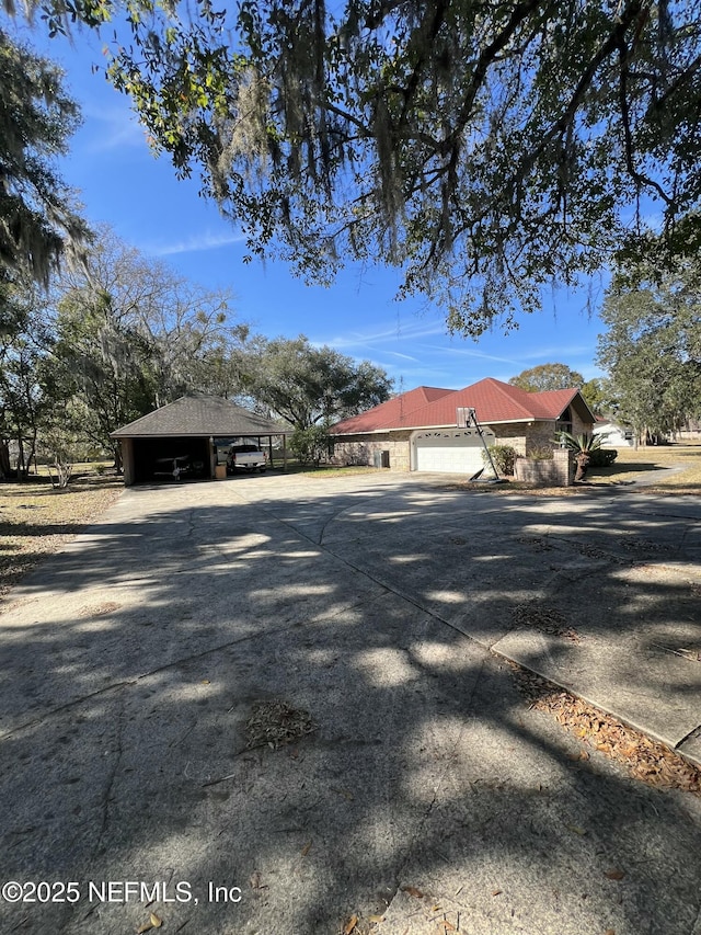 view of property exterior with a carport