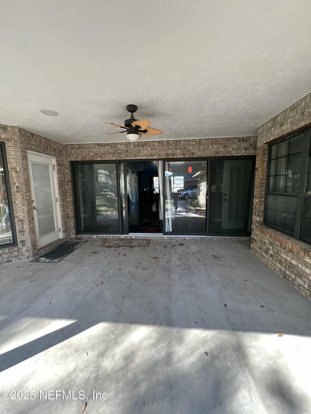 view of patio / terrace with ceiling fan