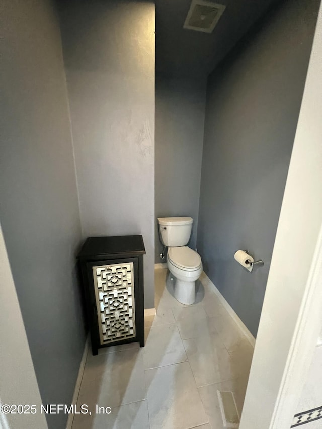 bathroom featuring toilet