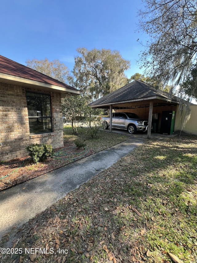 view of property exterior featuring a carport