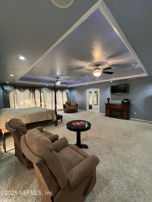 living room with ceiling fan and carpet flooring