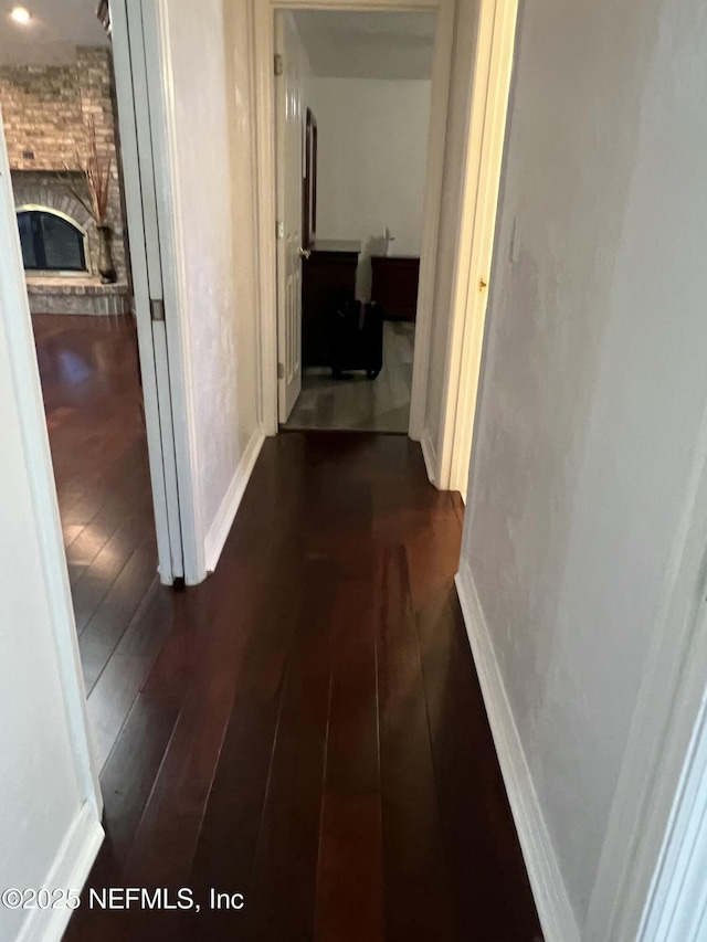 hall featuring dark hardwood / wood-style floors