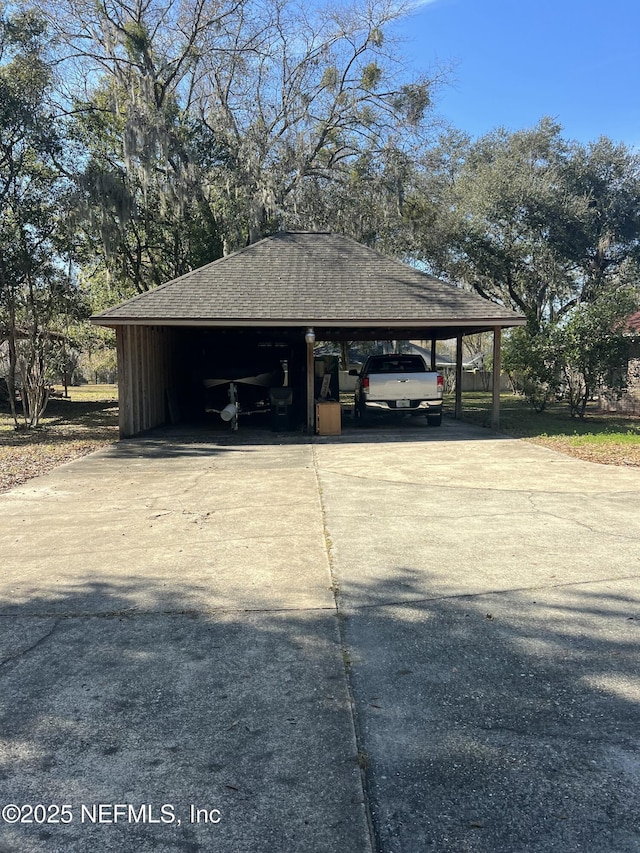 view of outdoor structure with a carport