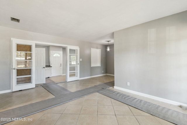 view of tiled spare room