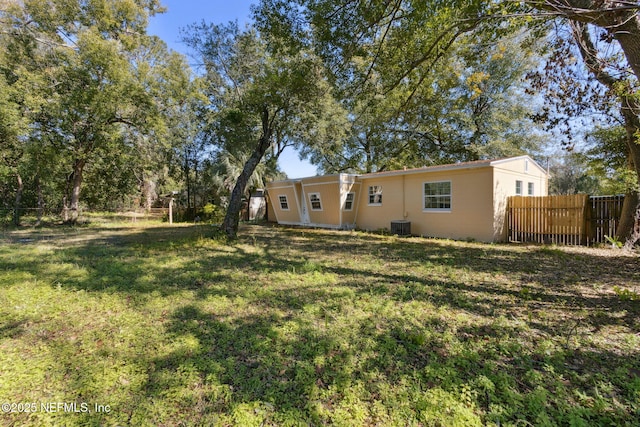 view of yard featuring central AC unit