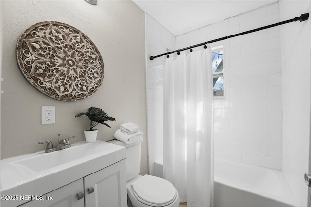 full bathroom featuring vanity, toilet, and shower / bath combo with shower curtain