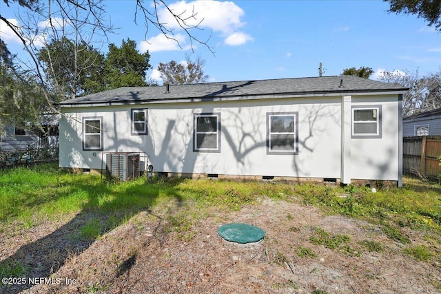 rear view of property with central air condition unit