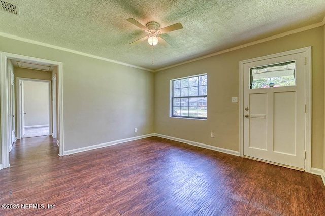 foyer entrance featuring crown molding, dark hardwood / wood-style floors, a textured ceiling, and ceiling fan