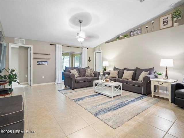 living room with light tile patterned flooring, lofted ceiling, and ceiling fan