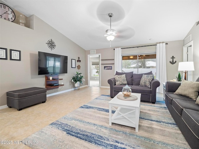 tiled living room featuring high vaulted ceiling and ceiling fan